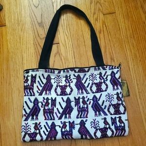 zippered cotton tote with embroidered pattern
